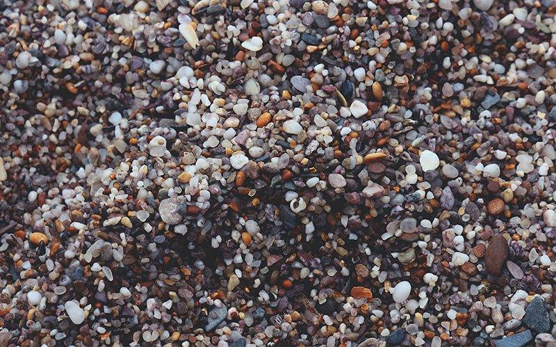 https://www.allpondsolutions.co.uk/cdn/shop/articles/how-to-use-gravel-in-your-pond-filtration-allpondsolutions.jpg?v=1695653782
