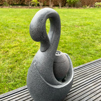 AllPondSolutions swan solar water feature with LED lights