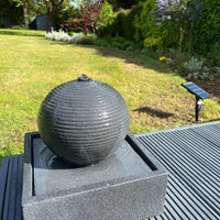 AllPondSolutions globe on plate box solar water feature with LED lights