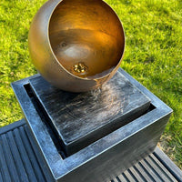AllPondSolutions golden globe box solar water feature with LED light