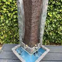 AllPondSolutions modern column tower water feature with LED lights