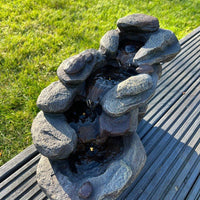 AllPondSolutions rock waterfall solar water feature with LED lights