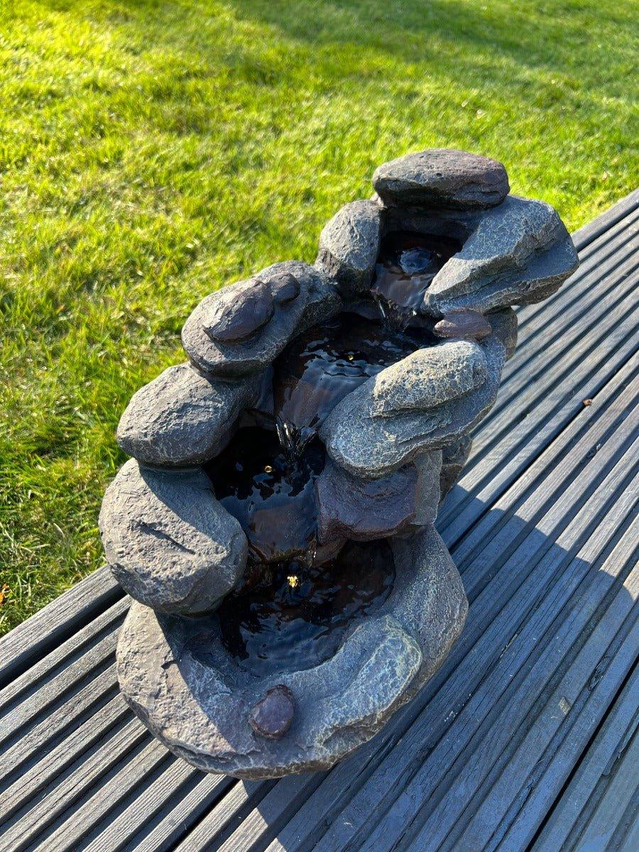 AllPondSolutions rock waterfall solar water feature with LED lights