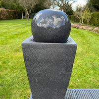 AllPondSolutions round ball on vase solar water feature, dark grey, with LED lights